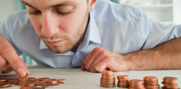 Man Counting Coins