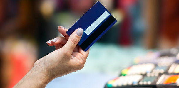 Person Holding Credit Card