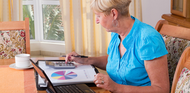 Woman Working on Home Budget