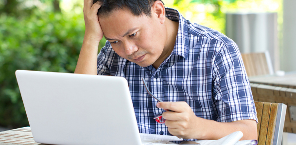 Despondent Man and Laptop